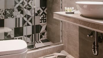 Shower, free toiletries, hair dryer, slippers