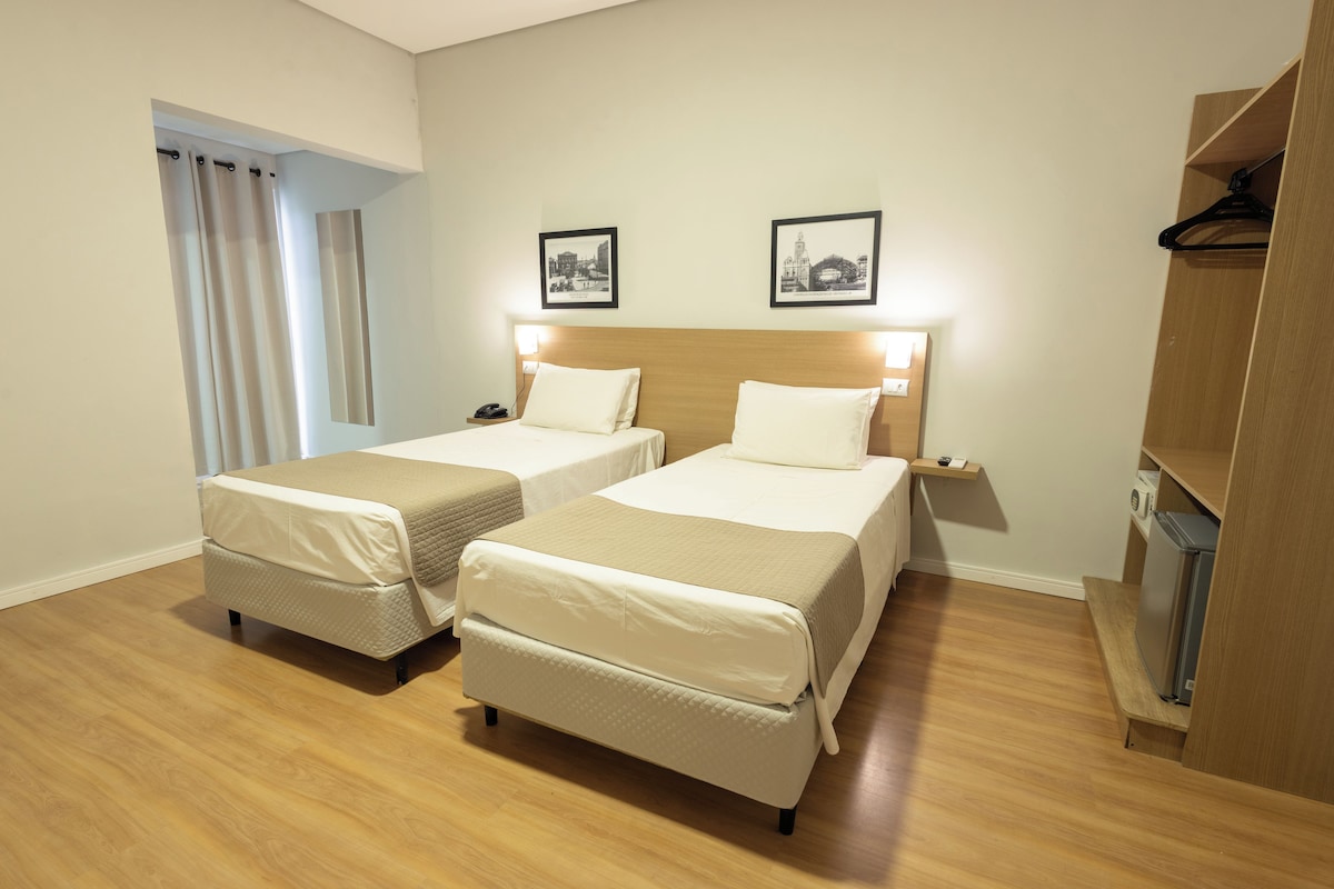 Standard Twin Room | Minibar, in-room safe, desk, free WiFi
