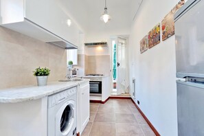 Apartment, 2 Bedrooms | Private kitchenette | Full-sized fridge, microwave, oven, stovetop - Cozy Cavour - My Extra Home (Rome)