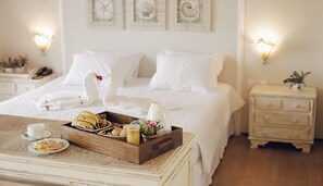 Suite prèmium | Minibar, planxa i posts de planxar, wifi gratuïta i roba de llit