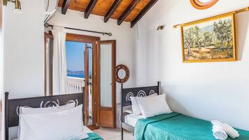 Villa, 2 Bedrooms (Delfi) | 2 bedrooms, in-room safe, iron/ironing board, free cribs/infant beds