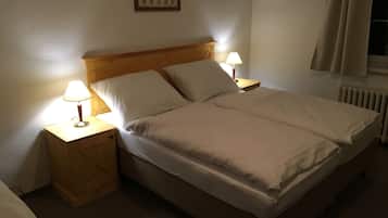 Double Room | 1 bedroom, blackout drapes, cribs/infant beds, bed sheets
