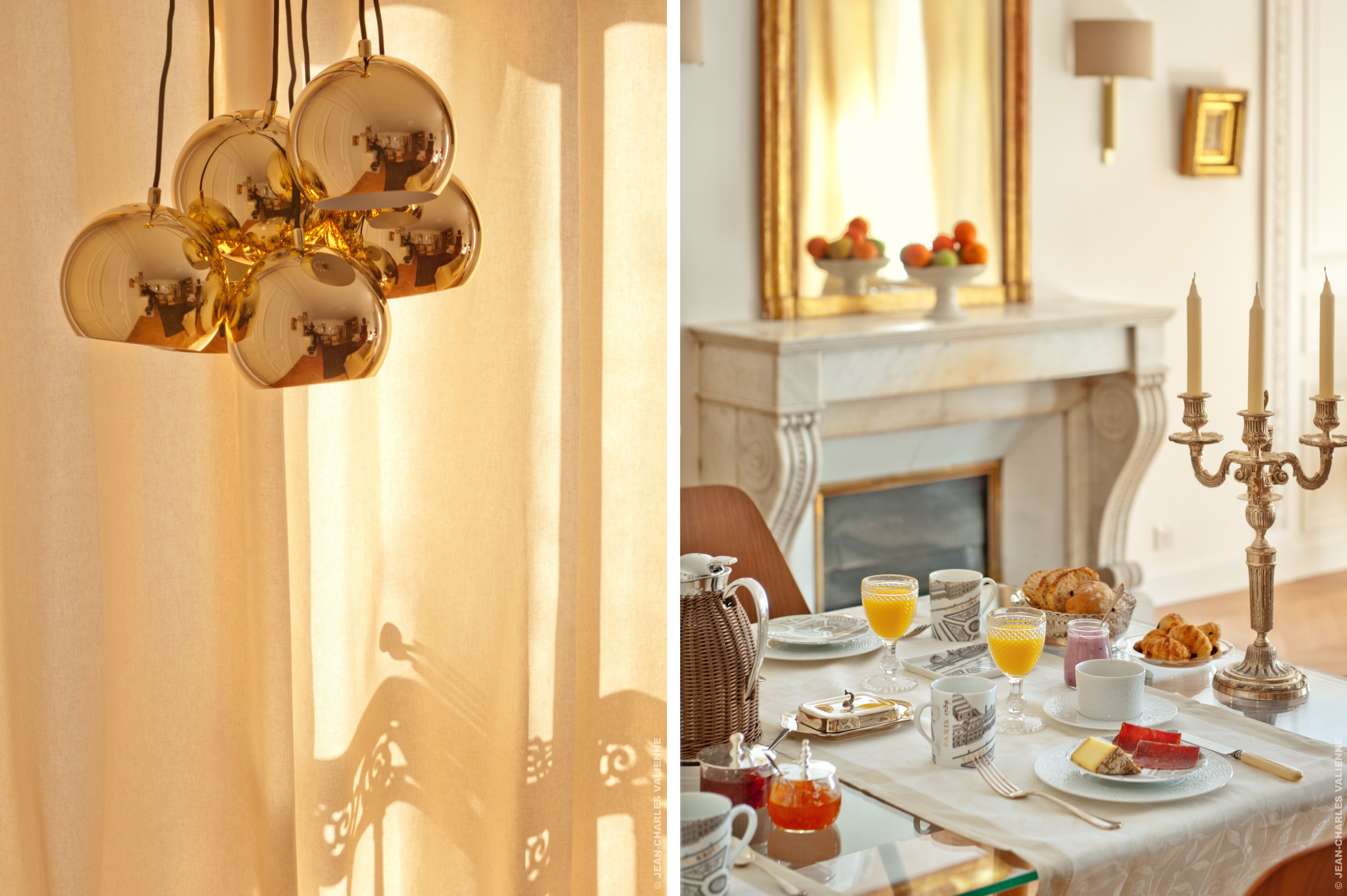 A breakfast setting with a table set for two, including plates, cups, and a candelabra.