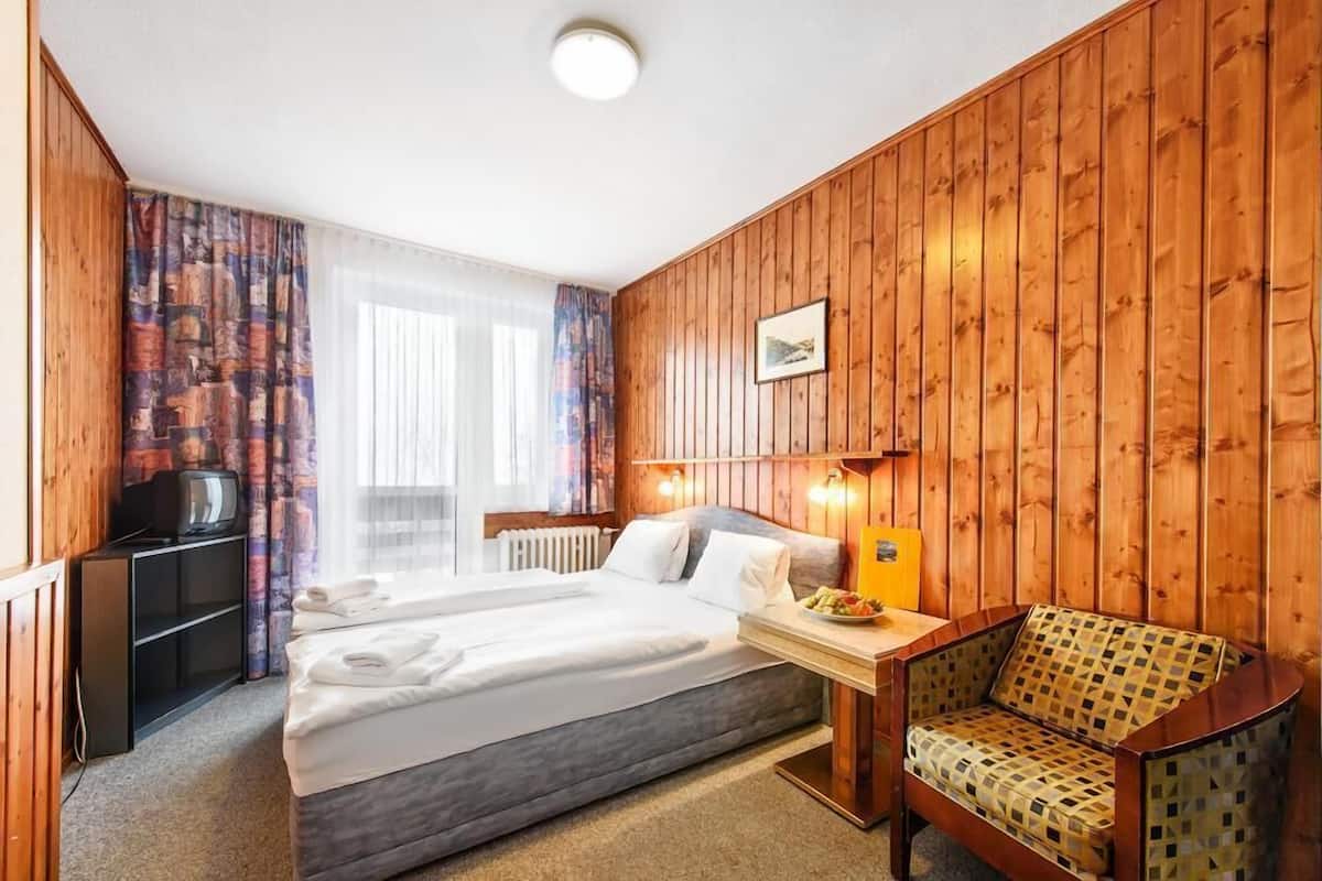 Desk, cots/infant beds, rollaway beds, free WiFi
