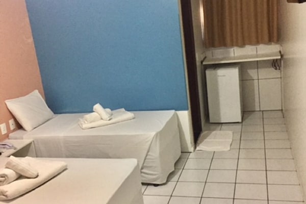 Quarto triplo standard | Individualmente mobiliados, cortinas blackout, Wi-Fi de cortesia