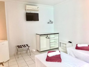 Quarto duplo standard | Individualmente mobiliados, cortinas blackout, Wi-Fi de cortesia