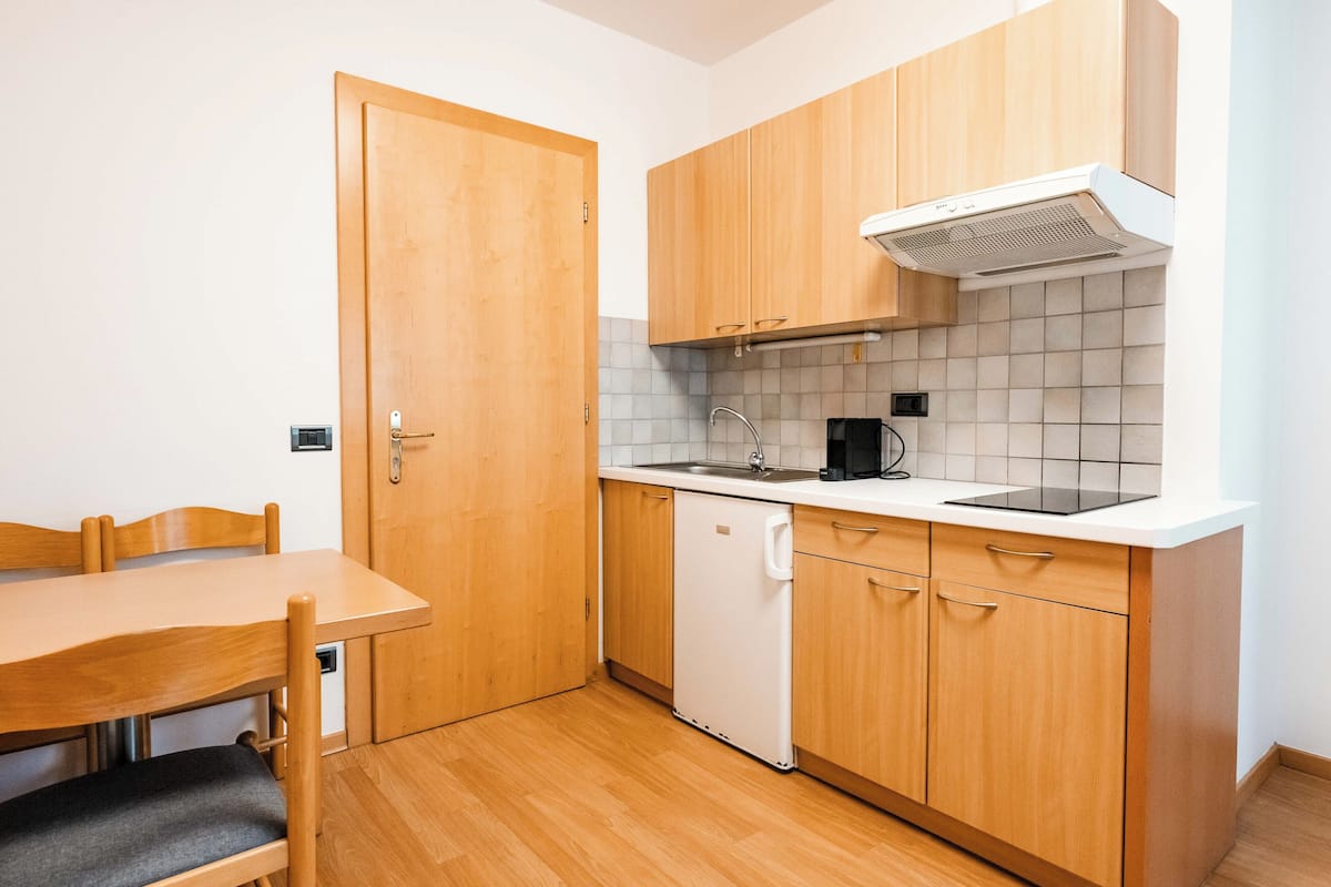 apartment, ground floor | private kitchen | microwave, stovetop, high chair, cookware/dishes/utensils