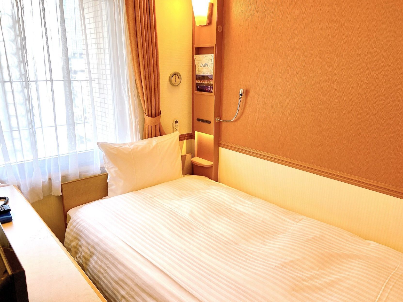 Desk, laptop workspace, free WiFi, bed sheets