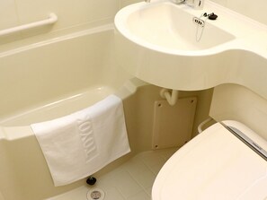 Combined shower/bathtub, hair dryer, bathrobes, slippers