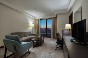 Suite, 1 Bedroom (King) | Living area | 40-inch LCD TV with satellite channels, TV, MP3 dock