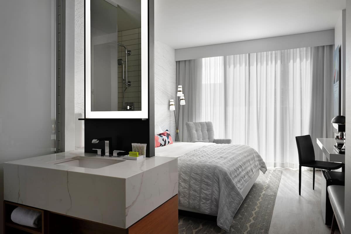 Premium bedding, down comforters, pillowtop beds, in-room safe
