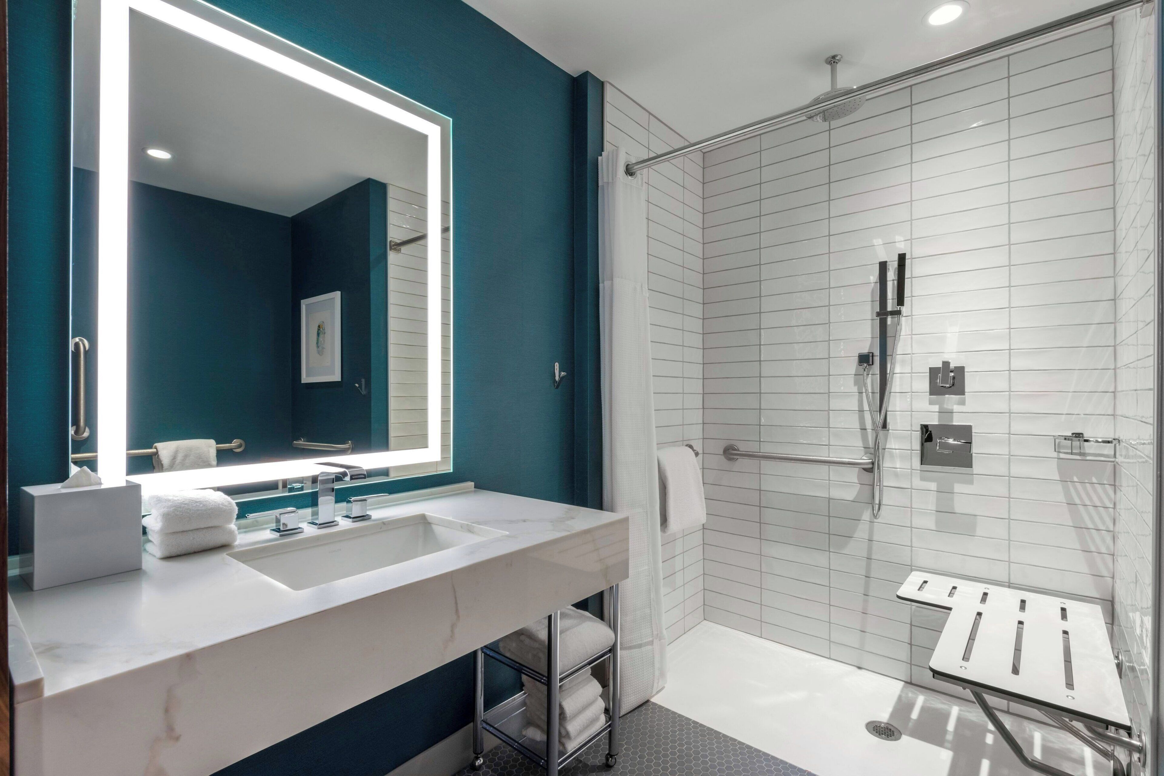 shower, rainfall showerhead, designer toiletries, hair dryer