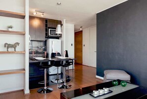 Apartment | Living area | 40-inch flat-screen TV with cable channels, TV - Sociedad Inmobiliaria (Santiago)