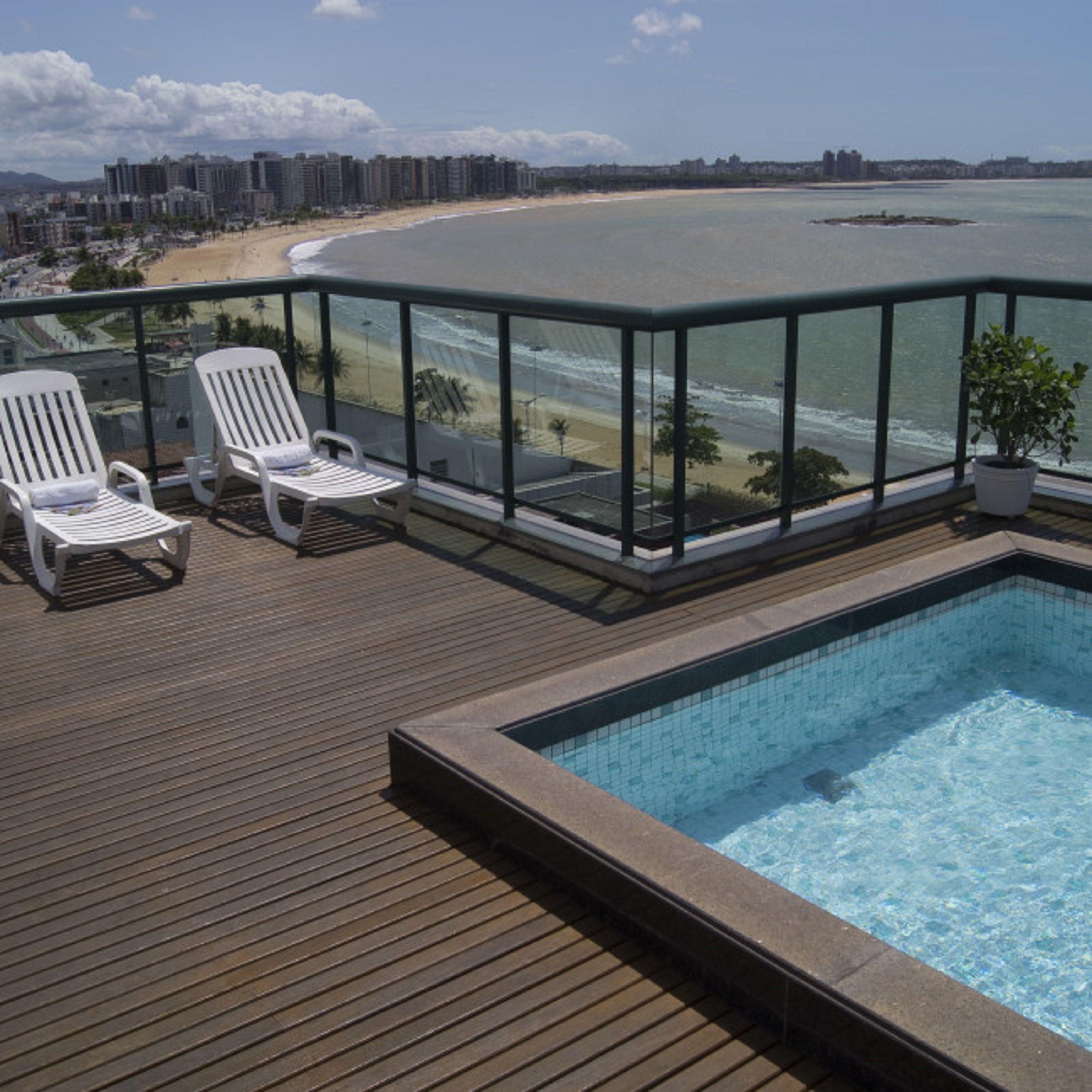 Indoor pool, outdoor pool, pool umbrellas, pool loungers