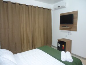 Quarto quádruplo | Frigobar, cortinas blackout, quartos à prova de som