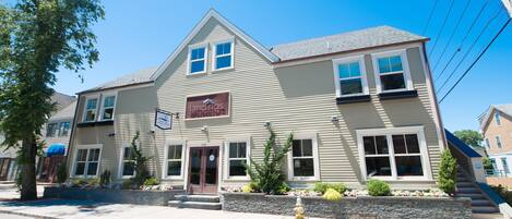 A two-story building with a sign reading "Landings."
