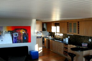 Panoramic Apartment, 2 Bedrooms | Private kitchen | Fridge, microwave, coffee/tea maker, electric kettle