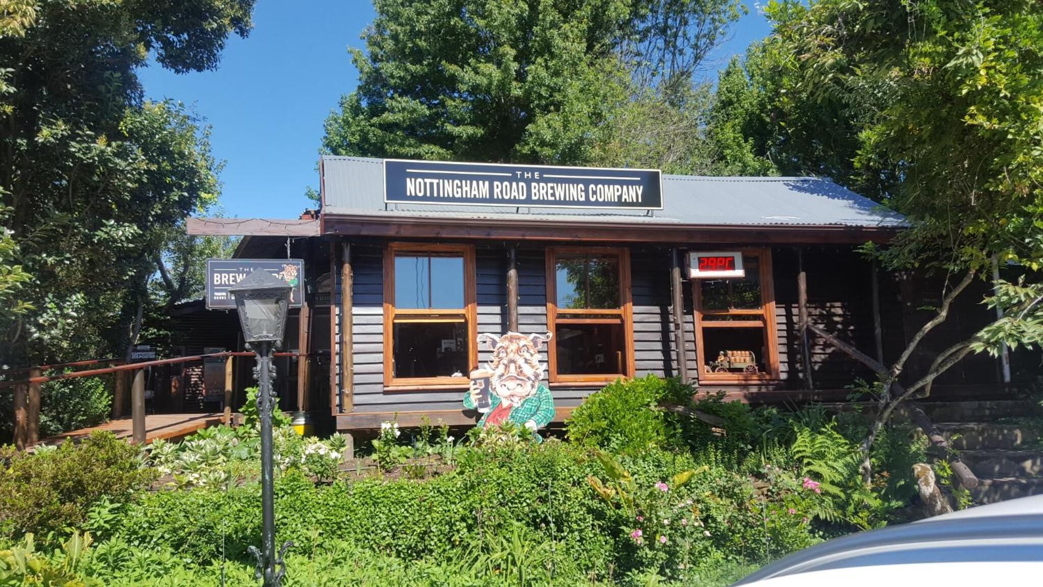 A rustic building with a sign reading "The Nottingham Road Brewing Company".