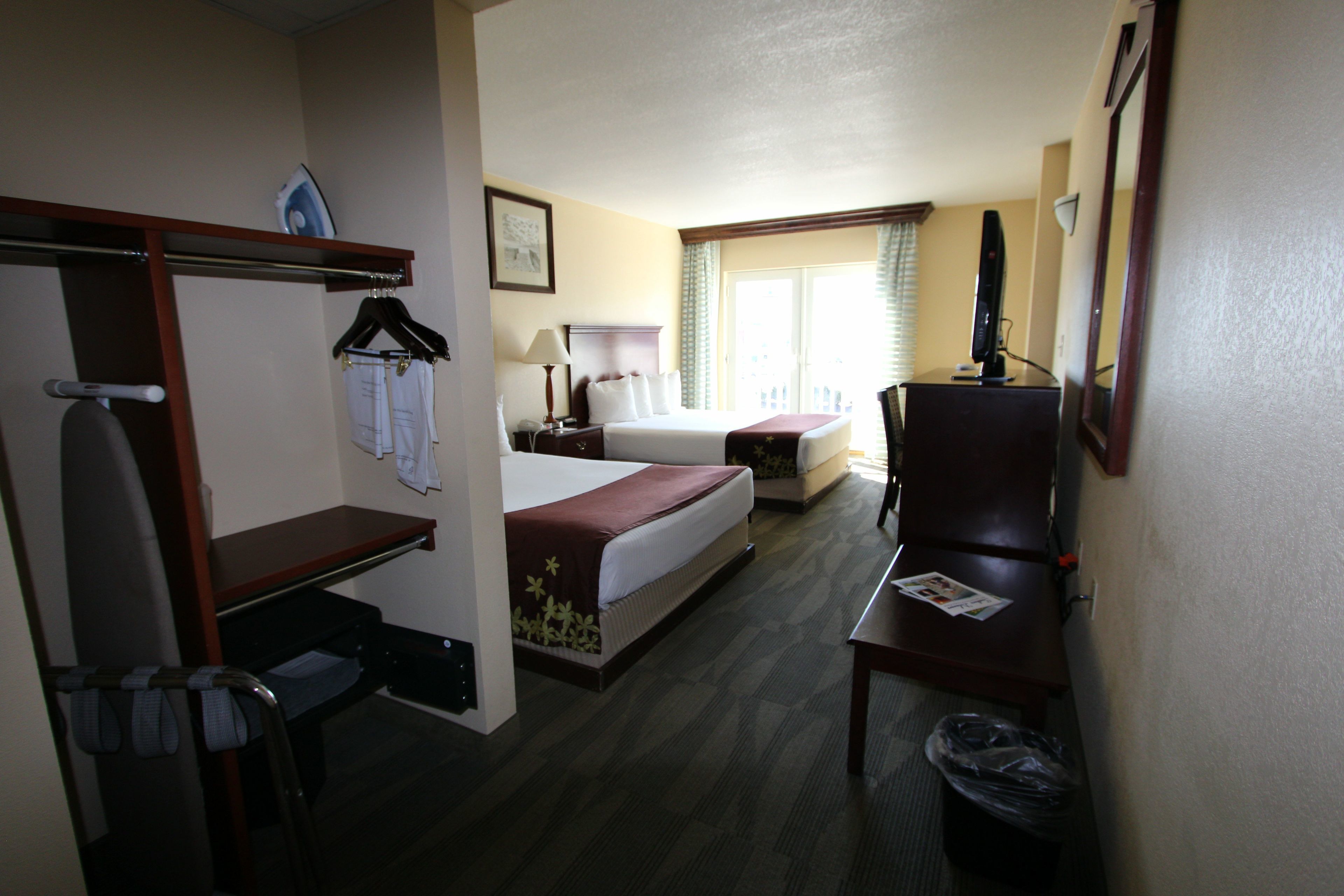 standard double room, refrigerator & microwave | in-room safe, desk, blackout curtains, iron/ironing board