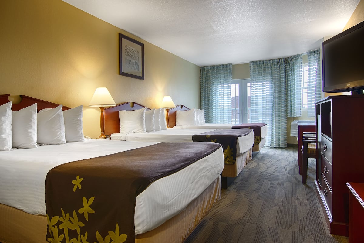 triple room, refrigerator & microwave | in-room safe, desk, blackout curtains, iron/ironing board