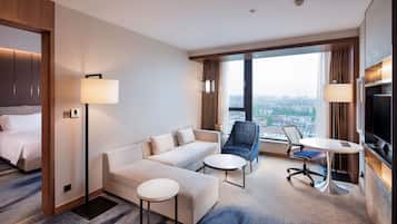 King Deluxe Suite | Premium bedding, minibar, in-room safe, desk