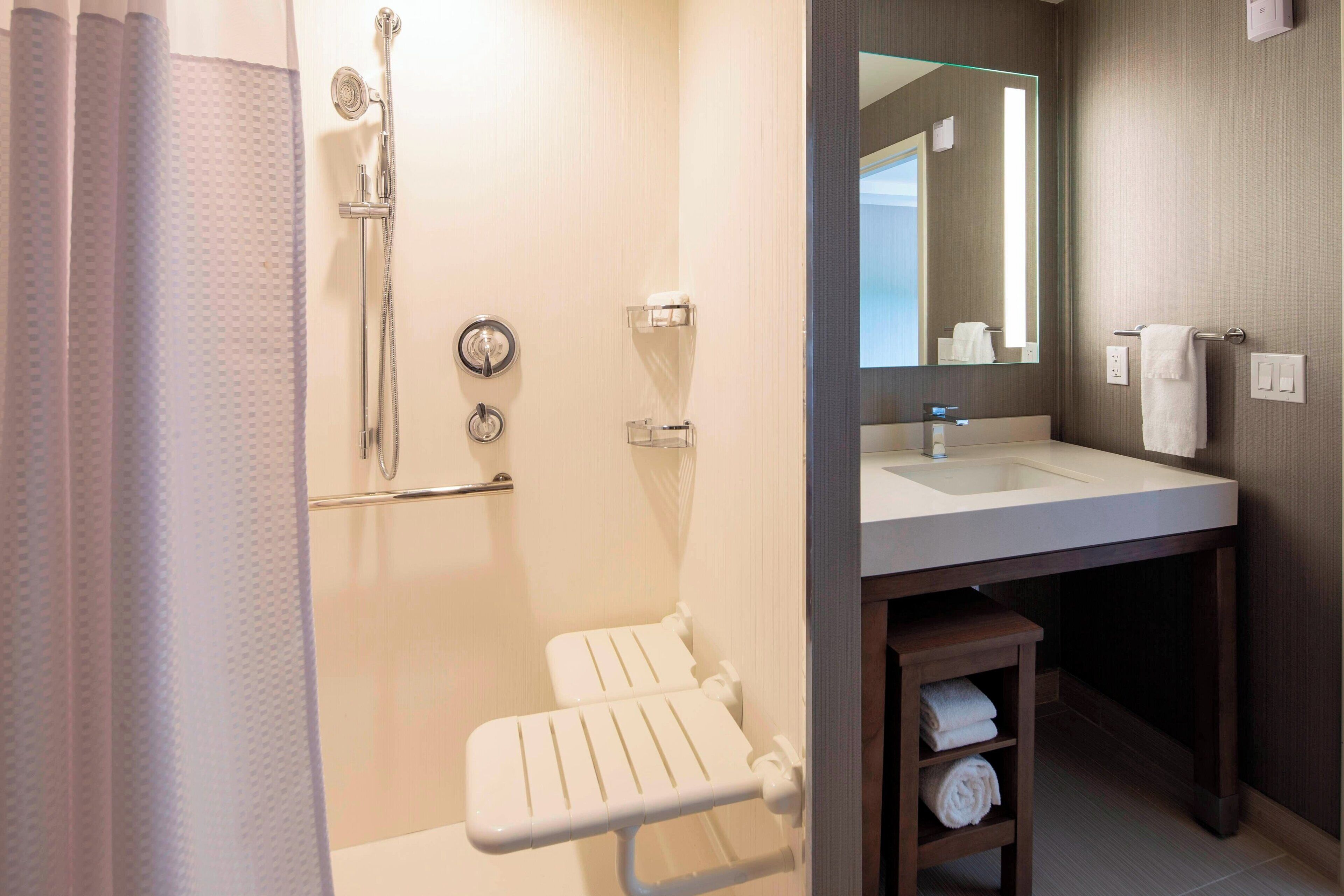 room, 1 king bed | bathroom | designer toiletries, hair dryer, towels, soap