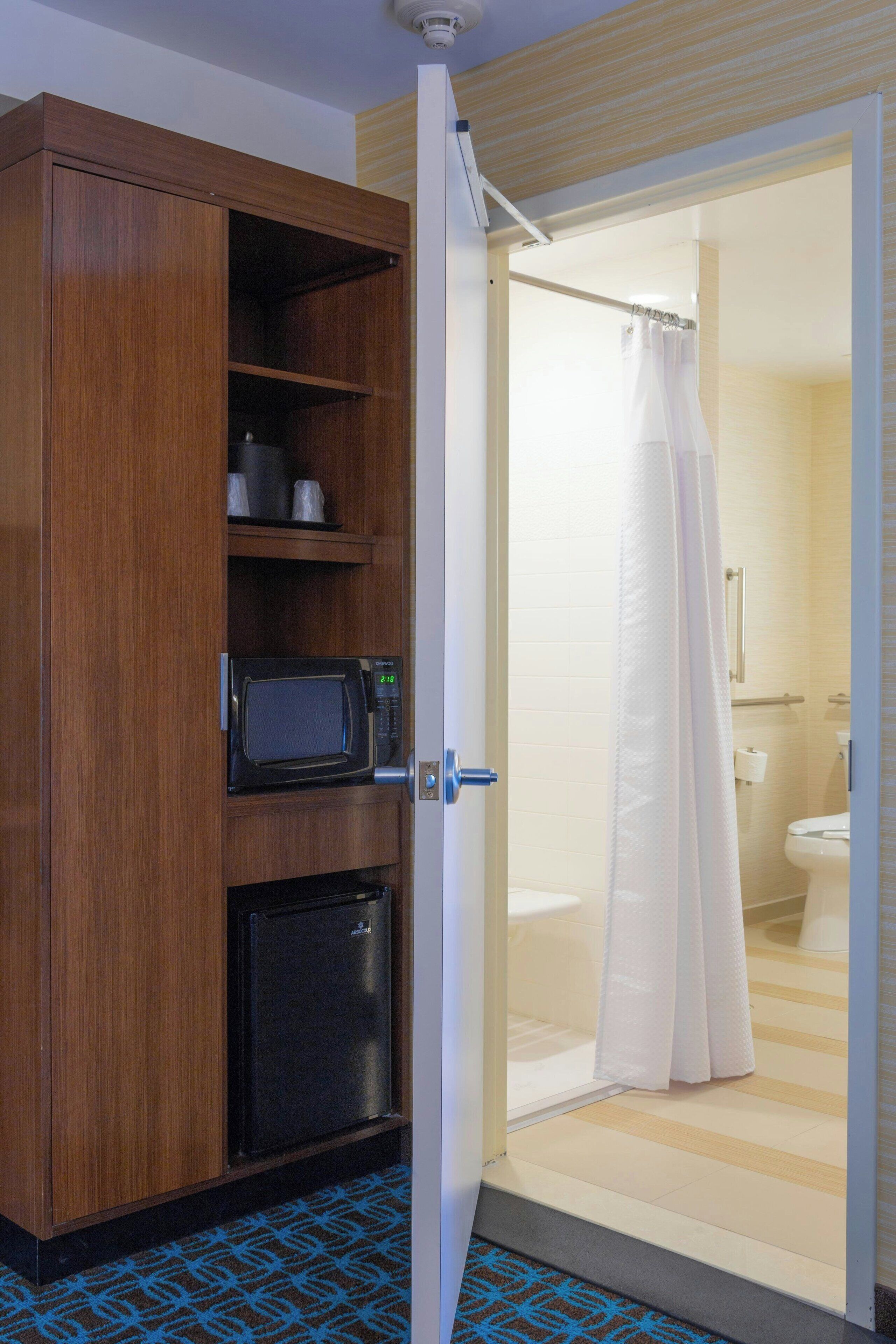 eco-friendly toiletries, hair dryer, towels, soap