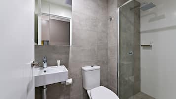 Shower, rainfall showerhead, hair dryer, towels