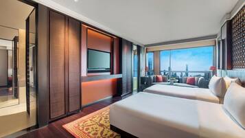 Premium bedding, down comforters, minibar, in-room safe
