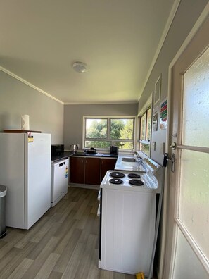 Family House, 4 Bedrooms, Partial Ocean View | Private kitchen | Full-sized fridge, microwave, oven, stovetop - Waitangi Beach House (Paihia)