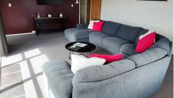 Family House, 2 Bedrooms, Partial Ocean View | Living area | Flat-screen TV
