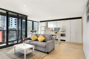 Apartment, 3 Bedrooms | Living area | Flat-screen TV - Manhattan Apartment (Melbourne)