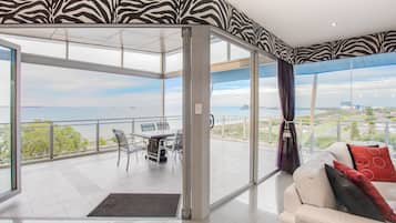 Executive Penthouse, 3 Bedrooms, Ocean View | Living area | 50-inch flat-screen TV with digital channels, TV, DVD player