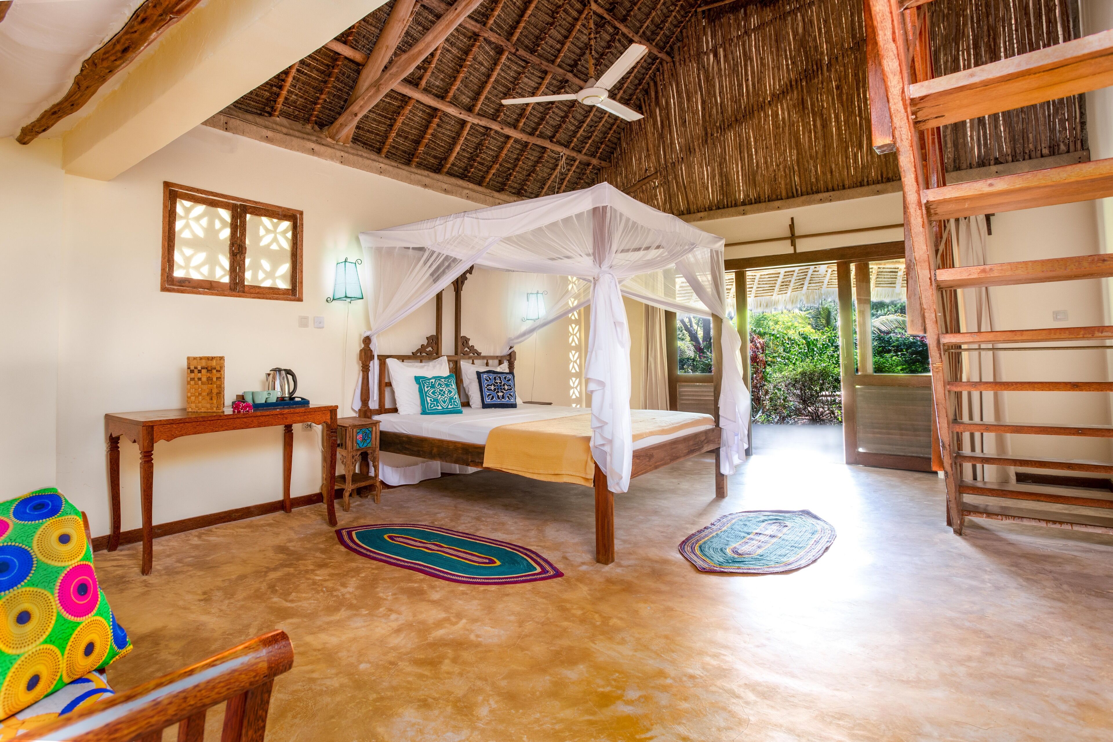 غرفة دوبلكس عائلية - عدة أسرّة - لغير المدخنين - منظر للحديقة | 1 غرفة نوم وأغطية فراش متميزة وخزنة داخل الغرفة ومكتب