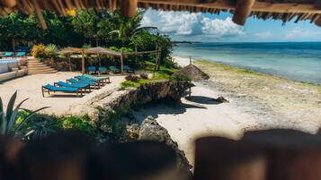 On the beach, white sand, beach massages