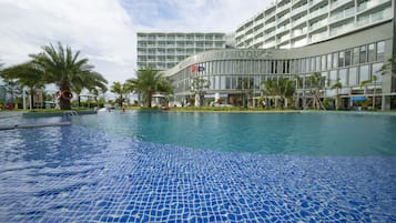 Outdoor pool, pool umbrellas, sun loungers