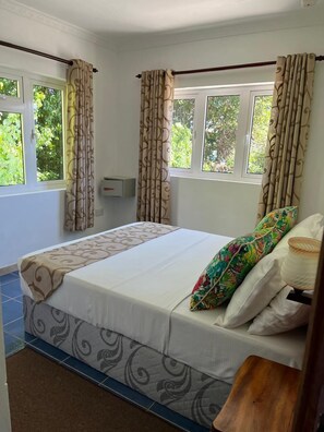 Apartment | In-room safe, laptop workspace, iron/ironing board, free WiFi - Cavern Apartments (Praslin Island)