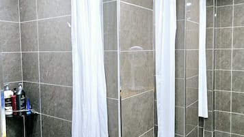 Shower, free toiletries, hair dryer, slippers