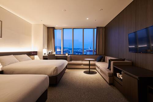 Quad Garden Suite - 2 Bottle of Wine, Minibar, OTT rent service | In-room safe, desk, laptop workspace, blackout curtains