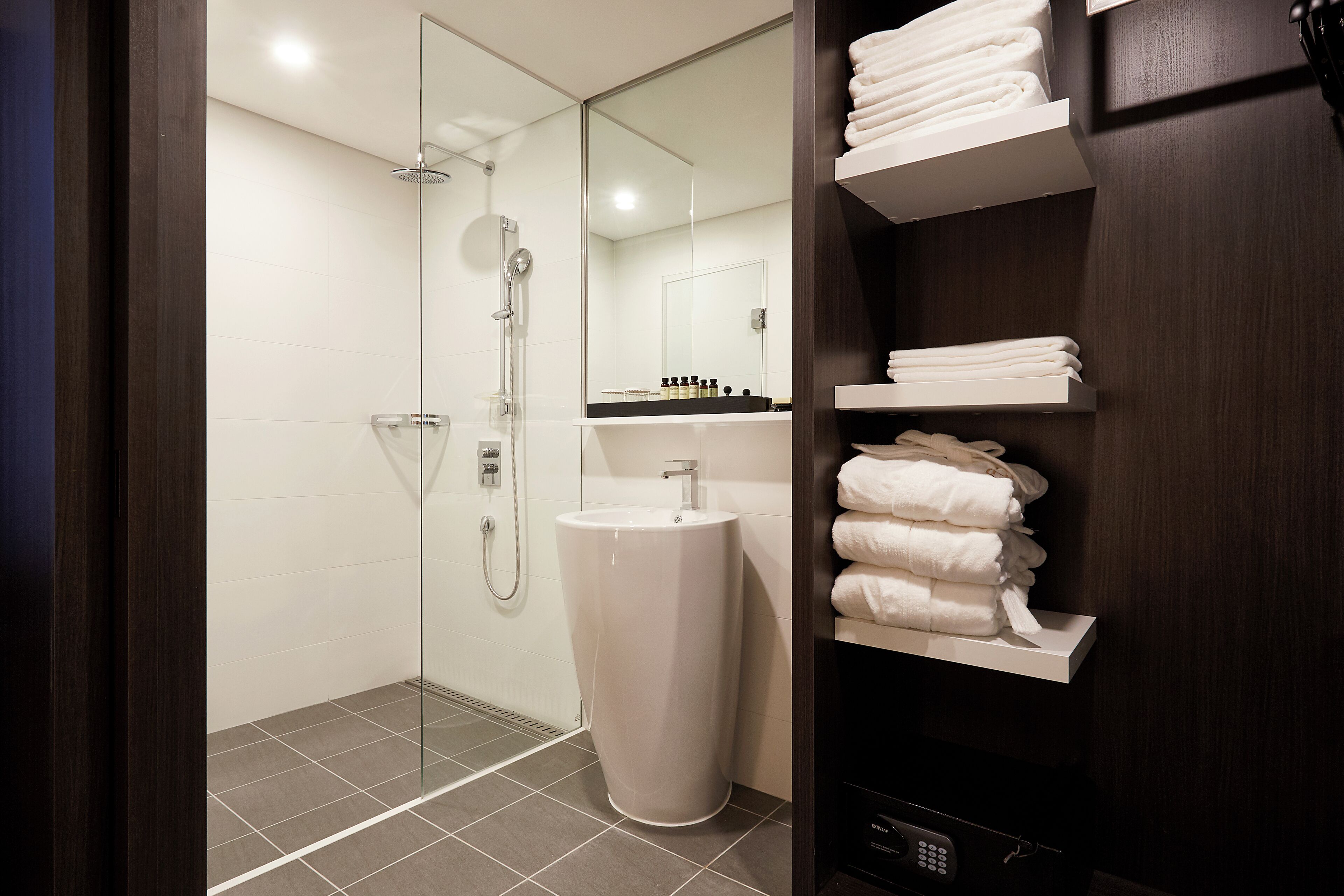 cinema family twin room | bathroom | free toiletries, hair dryer, bathrobes, slippers