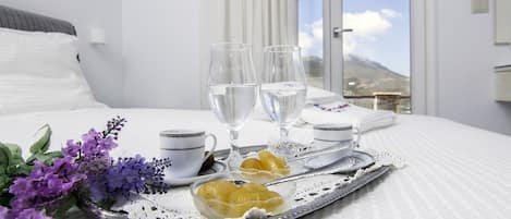 Deluxe Triple Room, Sea View | In-room safe, desk, blackout drapes, soundproofing