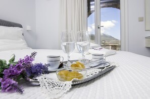 Deluxe Triple Room, Sea View | In-room safe, desk, blackout curtains, soundproofing