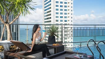 Outdoor pool, open 6:00 AM to 8:00 PM, pool loungers