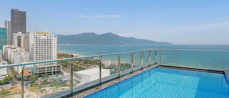 Outdoor pool, open 6:00 AM to 8:00 PM, sun loungers