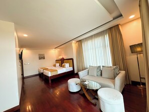 Family Suite, Connecting Rooms | Minibar, in-room safe, desk, blackout drapes - LBN Asian Hotel (Kampong Cham)
