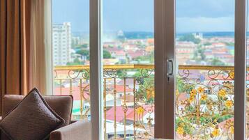 Superior Twin Room | Minibar, in-room safe, desk, blackout curtains