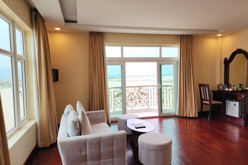 Mekong Twin Room, Balcony, River View | Minibar, in-room safe, desk, blackout drapes