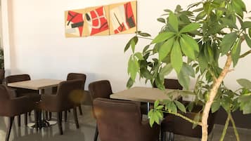 Breakfast, lunch, dinner served; local and international cuisine