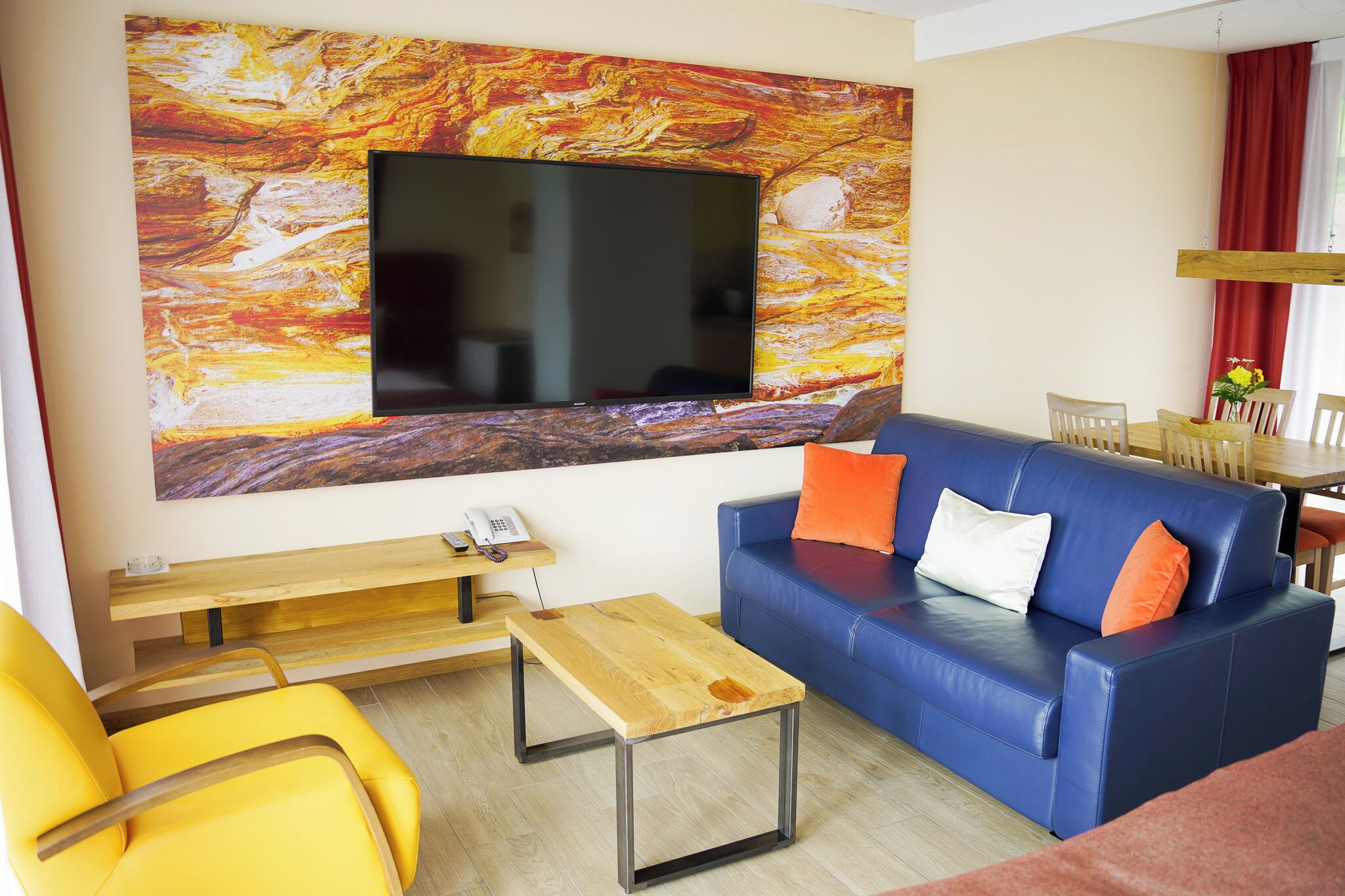 standard suite | living area | 65-inch flat-screen tv with cable channels, tv, table football