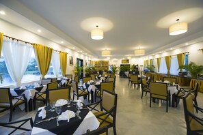 Breakfast, lunch, dinner served; international cuisine, pool views